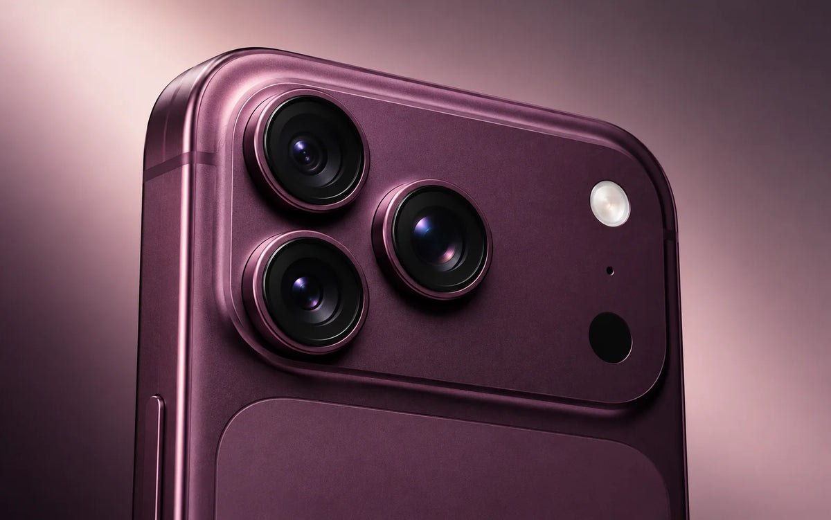 Close-up concept illustration of a burgundy iPhone camera module with three lenses.