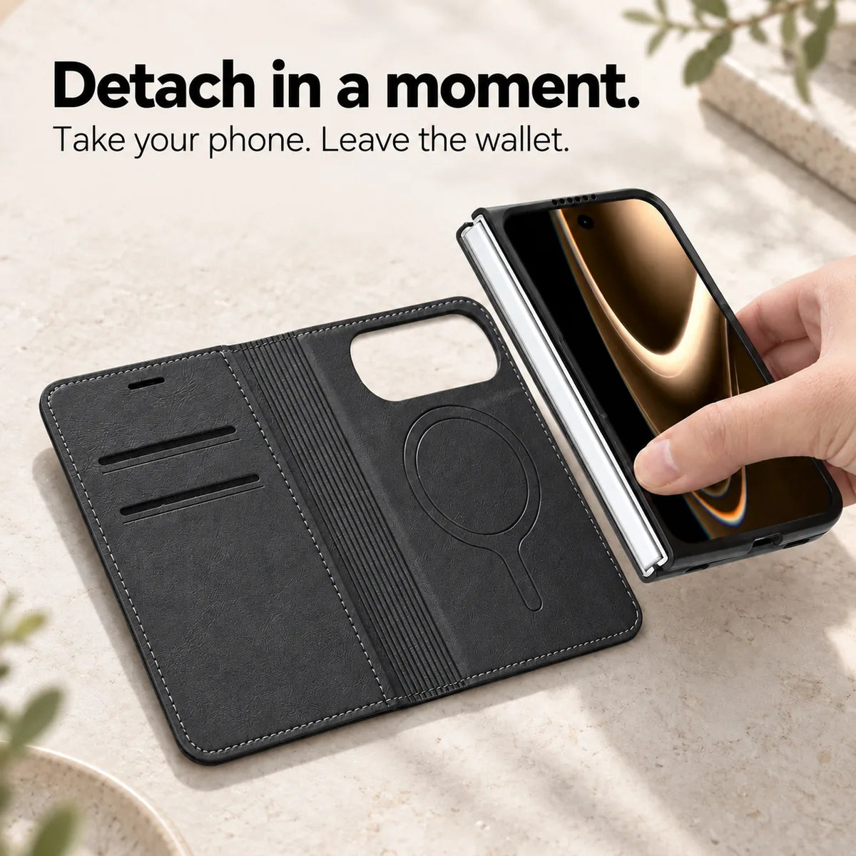 Phone and fitted case being lifted away from the open Midnight Black magnetic wallet folio. #color_Midnight Black