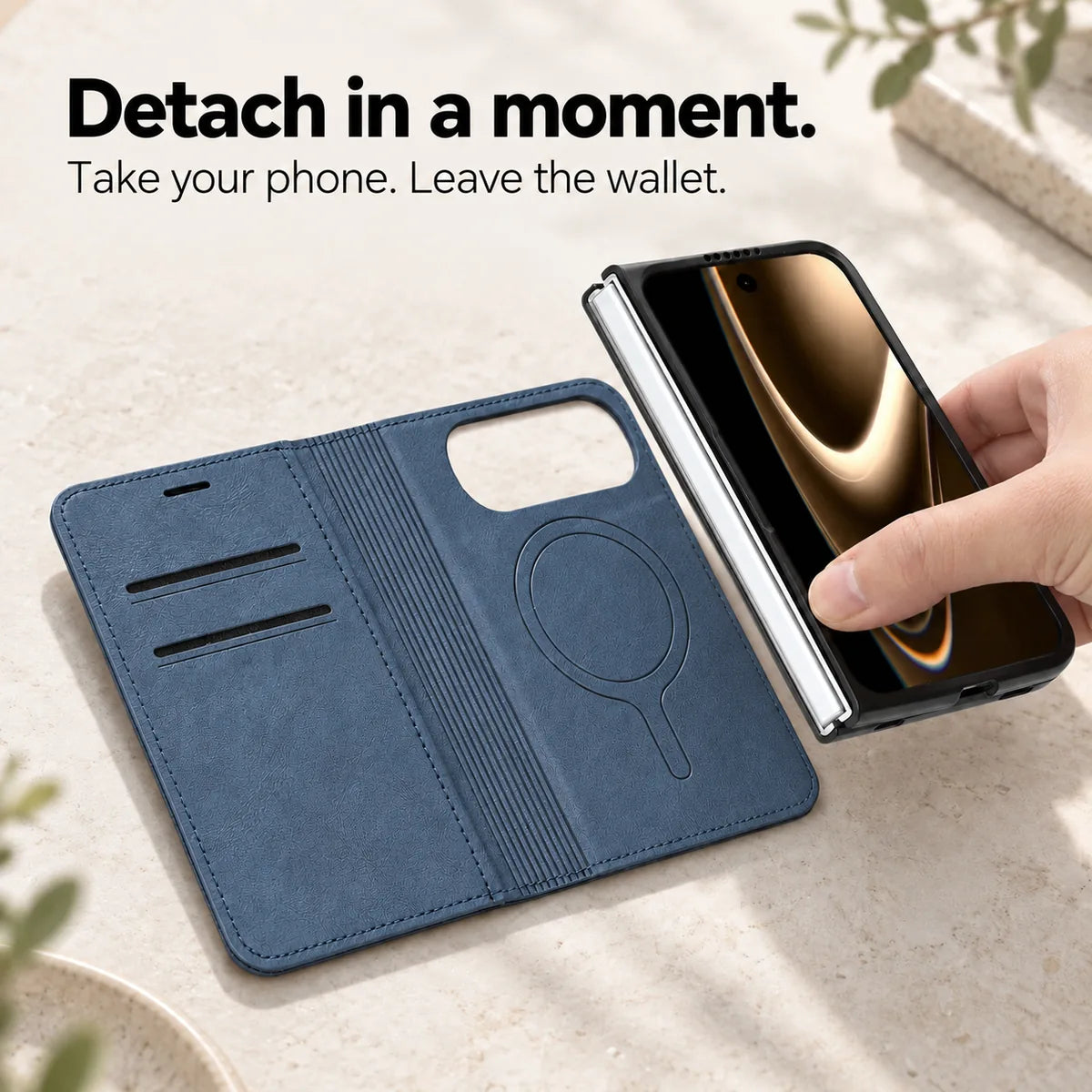 Phone and fitted case being lifted away from the open Sapphire Blue magnetic wallet folio. #color_Sapphire Blue