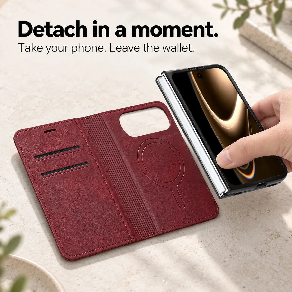 Phone and fitted case being lifted away from the open Burgundy magnetic wallet folio. #color_Burgundy