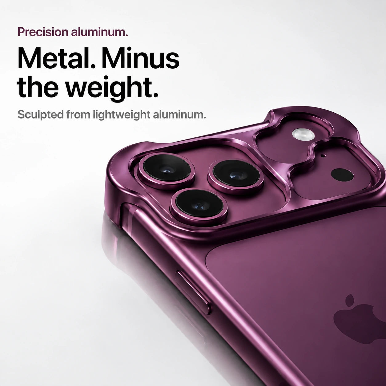 Dark purple sculpted metal phone case showing a close view of its sculpted camera guard #color_Dark Cherry