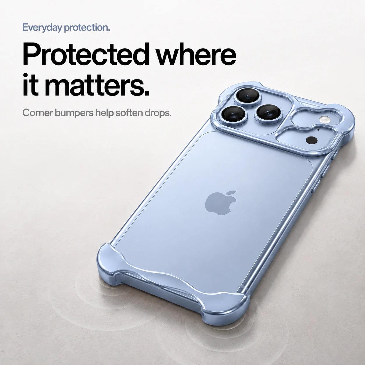 Light blue sculpted metal phone case on a desk showing its protective corner bumpers #color_Light Blue