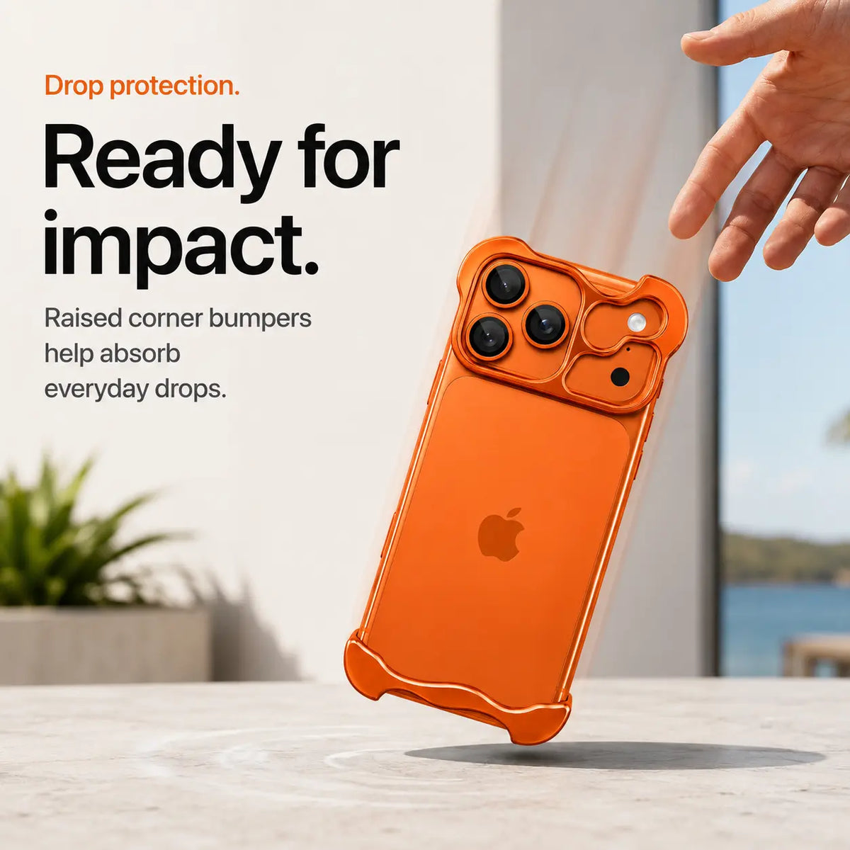 Orange sculpted phone case shown during a corner drop demonstration #color_Cosmic Orange