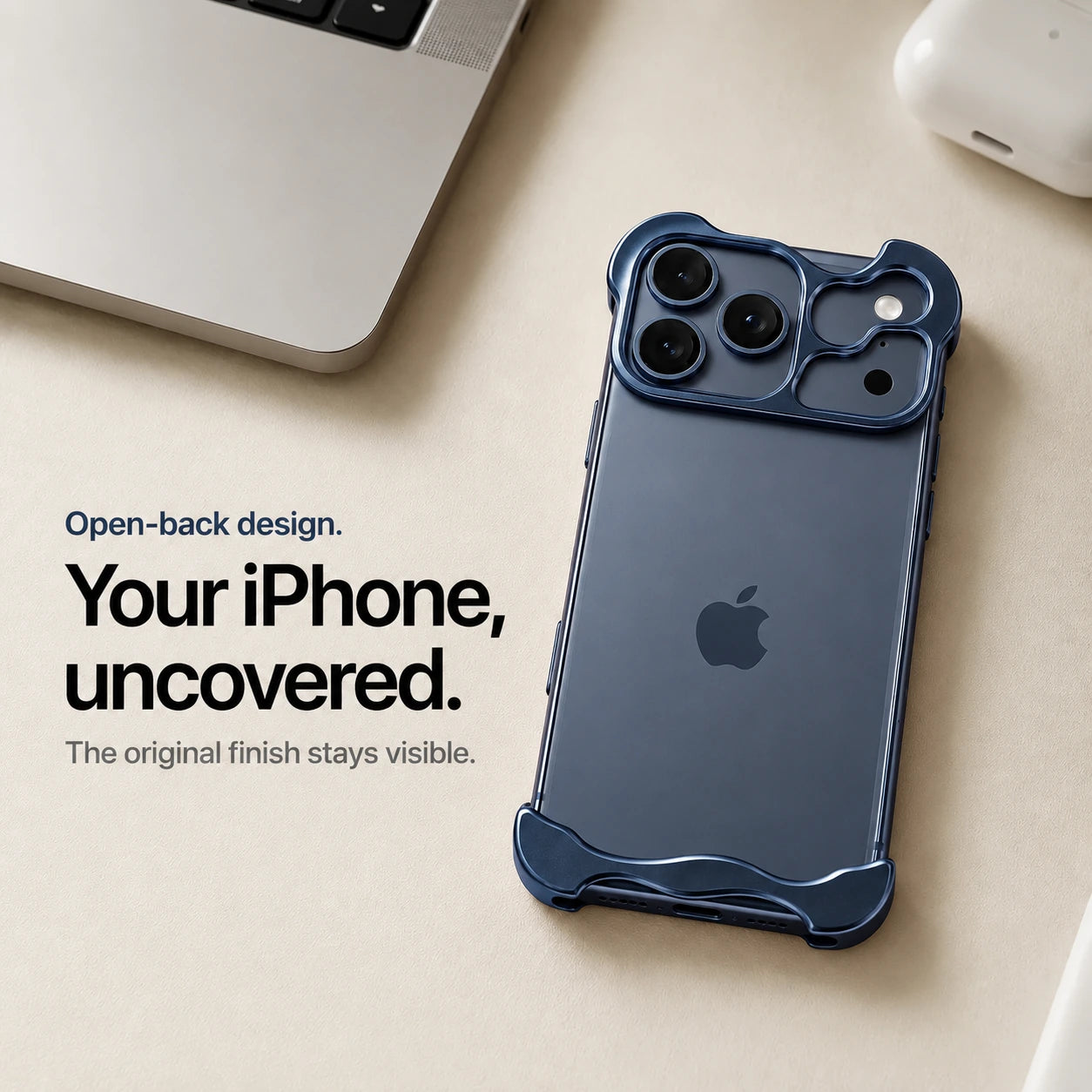 Navy blue sculpted metal phone case on a desk showing the open back #color_Deep Blue