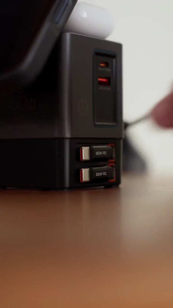PowerTower 105W 6-in-1 charging station — retractable cables, ready on demand
