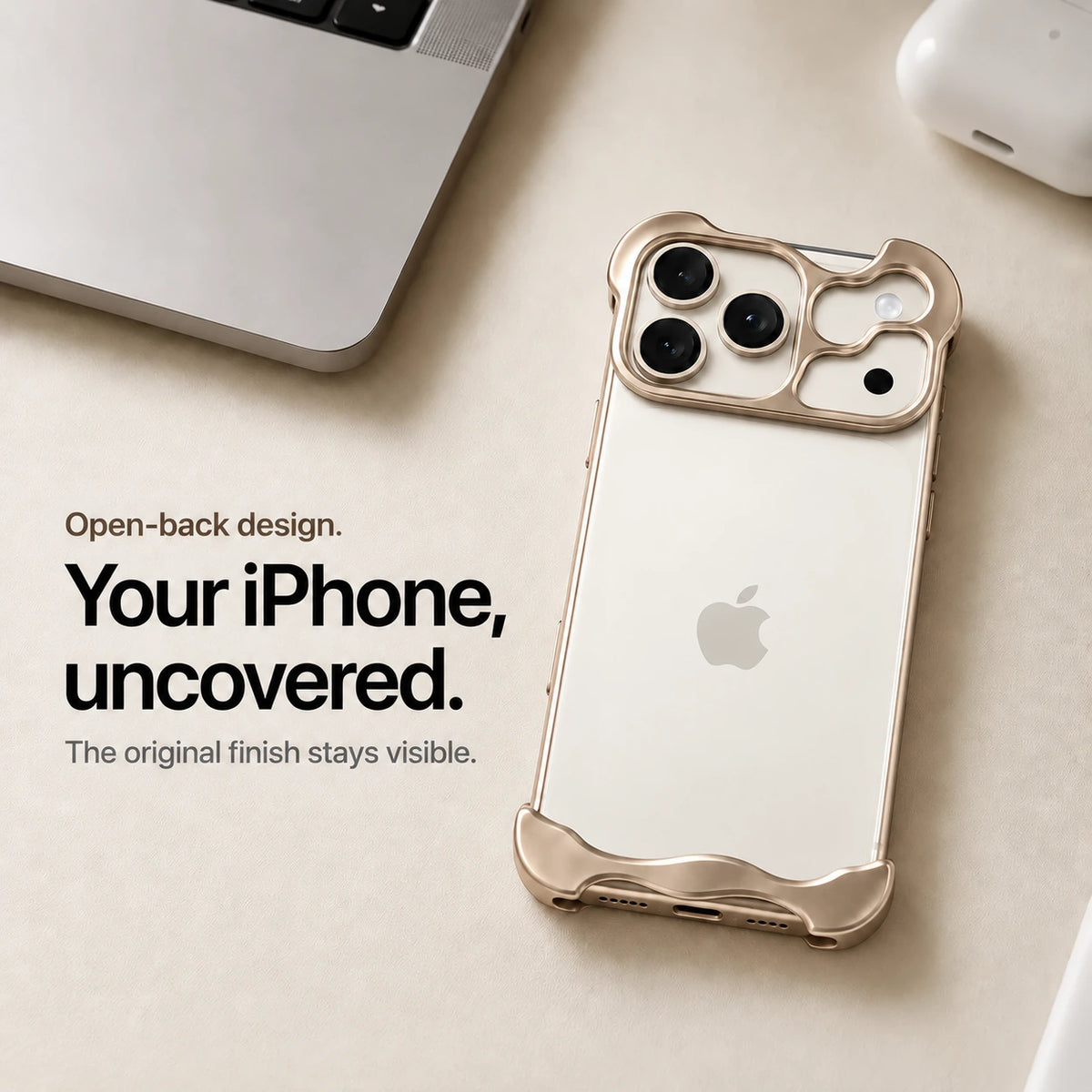 Sand gold sculpted metal phone case on a desk showing the open back #color_Desert Gold