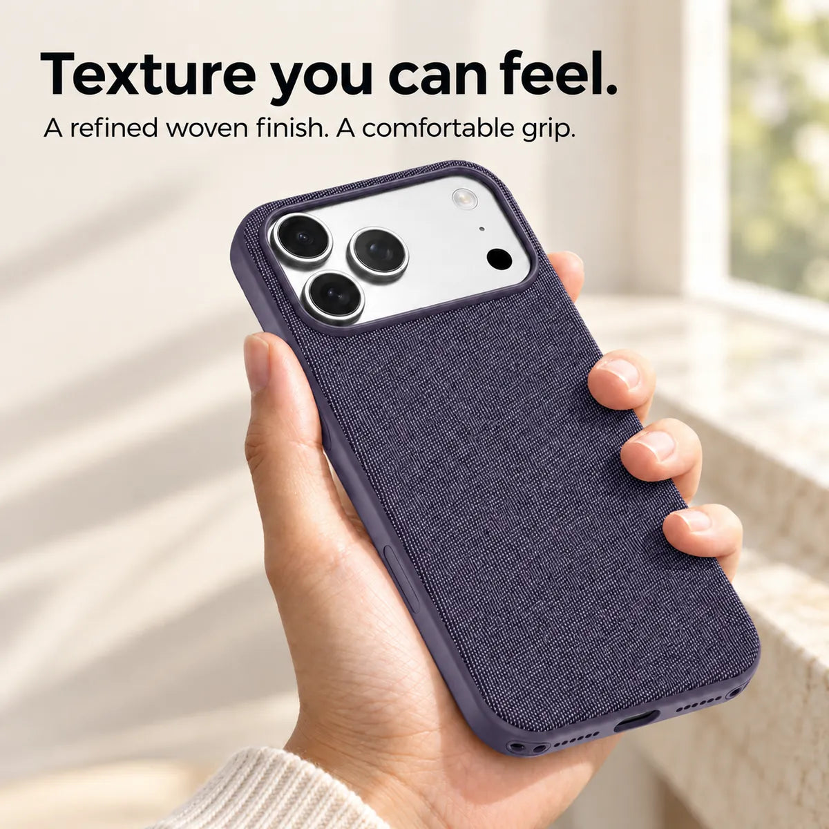 Hand holding a Dusk Purple woven phone case, showing its textured fabric finish. #color_Dusk Purple